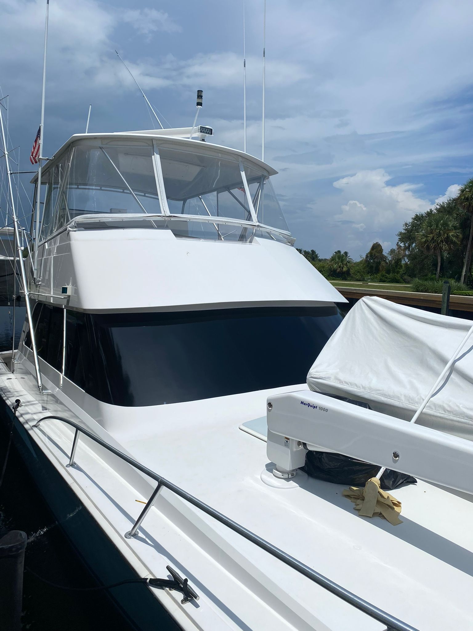Sophisticated brow wrap enhancing the luxury appeal of this Sunseeker yacht. Premium materials with expert installation.